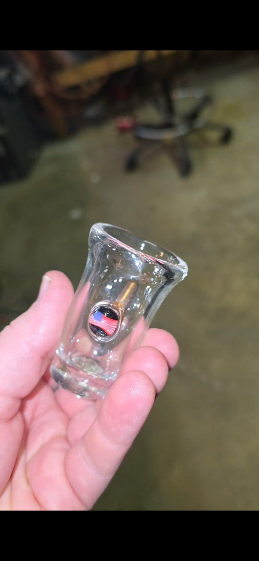 Shotglass with bullet and millie